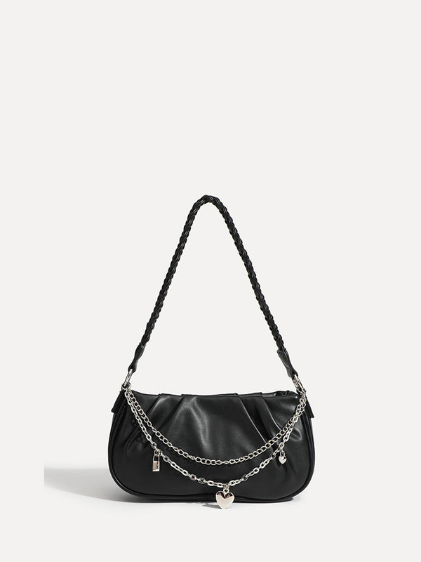 Slouchy hobo shoulder bag with gathered leather-look panels, silver-tone chain with charm pendants, and braided strap, detail