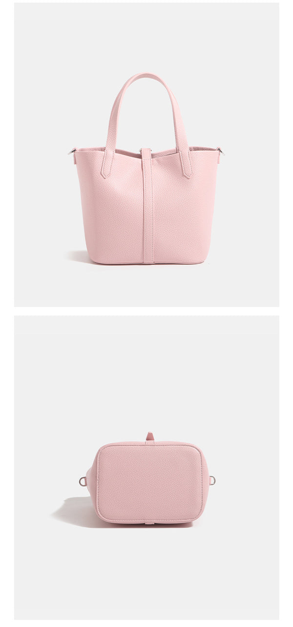 Small structured pebbled leather-look bucket tote bag with dual top handles and silver-tone hardware, detail view 15