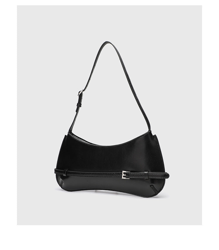 Curved baguette shoulder bag with front buckle strap and adjustable thin strap in glossy leather-look finish, detail view 14