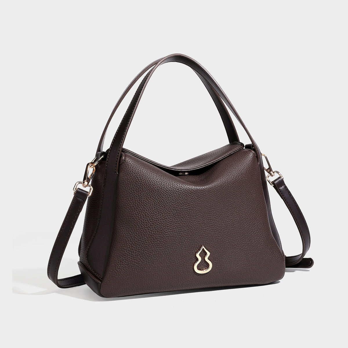 Structured pebbled leather-look shoulder bag with flap top, gold-tone emblem hardware, dual top handles, and detachable