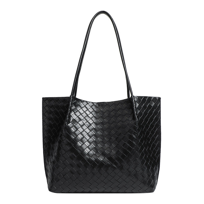 Large black woven leather-look tote bag with twin shoulder straps and matching inner pouch, detail view 5