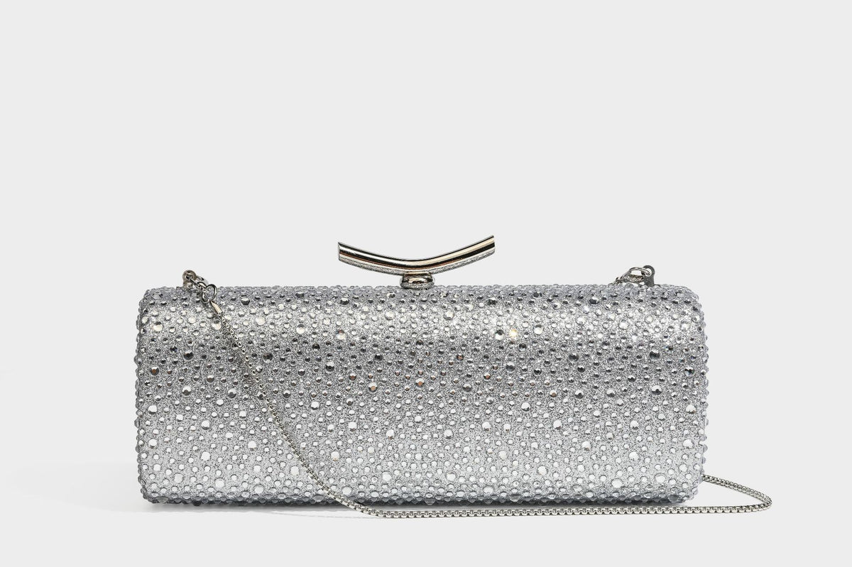 Structured rectangular hard-case clutch bag covered in all-over rhinestone crystal embellishment with curved kiss-lock top