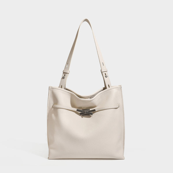 Large structured tote bag in pebbled leather-look finish with silver-tone twist-knot front detail and adjustable shoulder