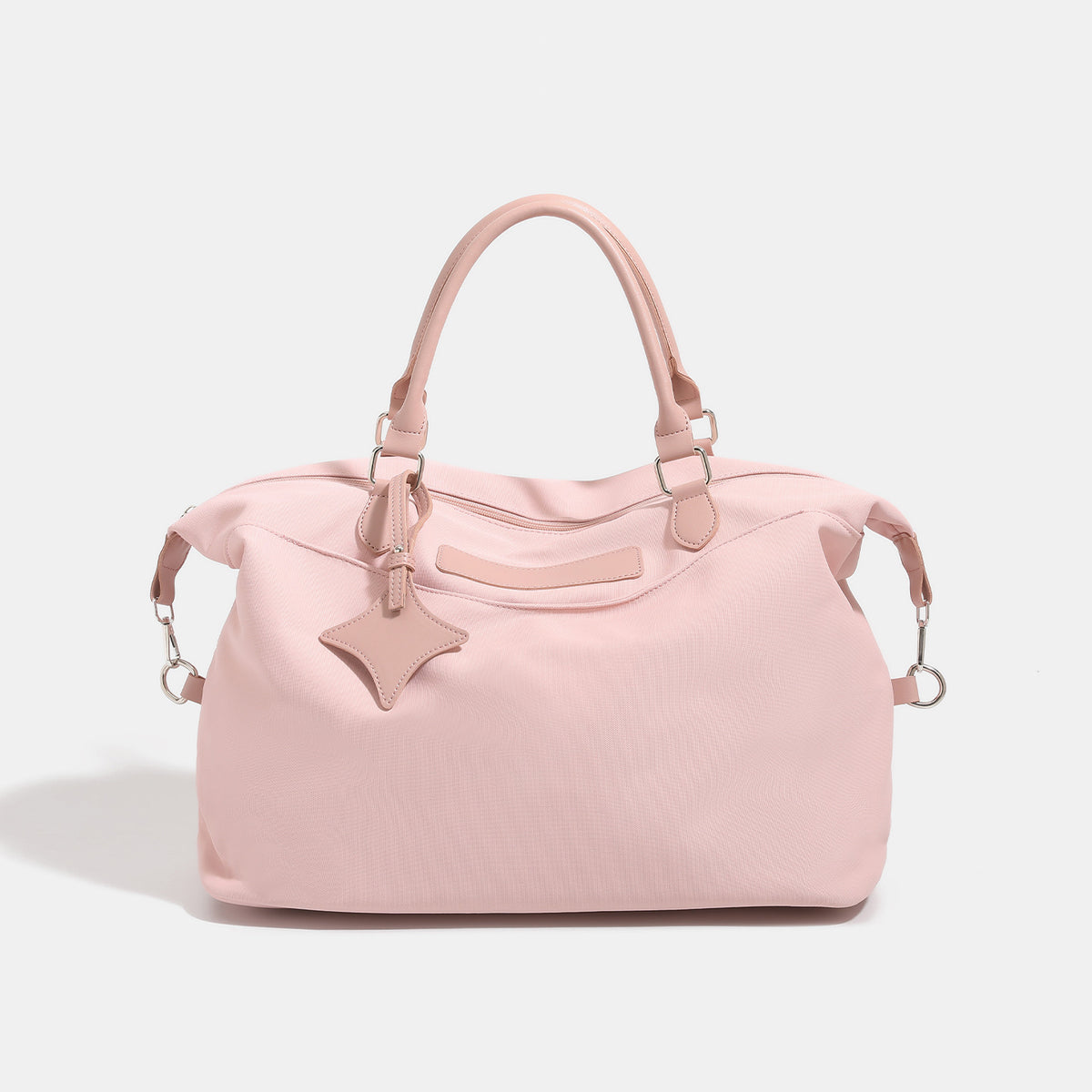 Large slouchy nylon tote bag with brown leather-look handles, double-pull zip closure, and star charm detail, detail view 6