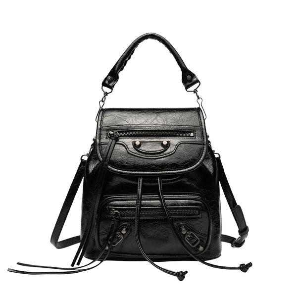 Small structured glossy leather-look convertible backpack handbag in black with flap closure, front zip pockets, metal stud