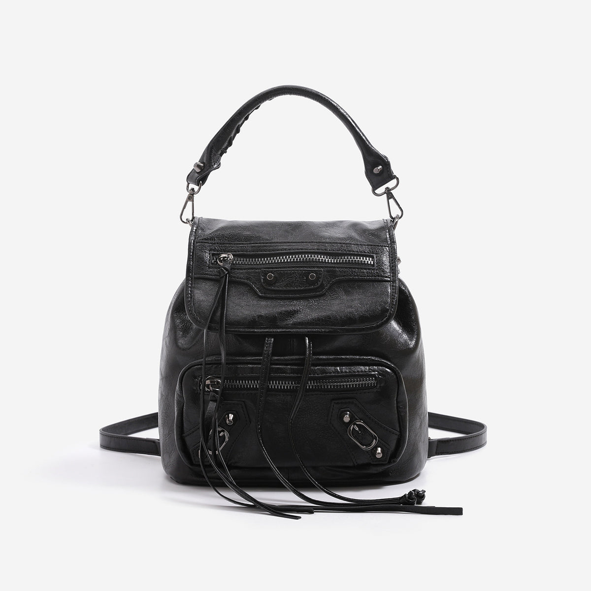 Mini flap backpack handbag with silver stud hardware, front zip pockets, and drawstring tassels, front view