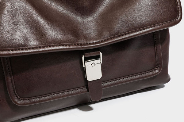 Structured rectangular satchel bag in dark espresso brown with smooth leather-look finish, flap front with silver turn-lock