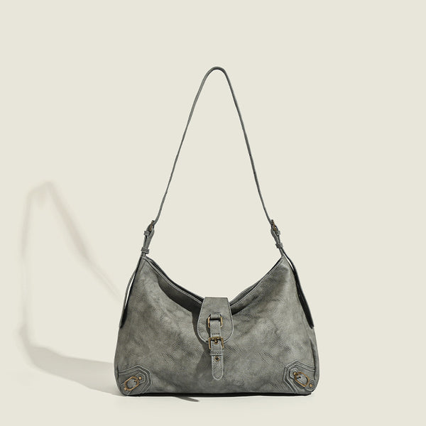 Slouchy distressed leather-look hobo bag with antique brass buckle closure and adjustable shoulder strap, detail view 7