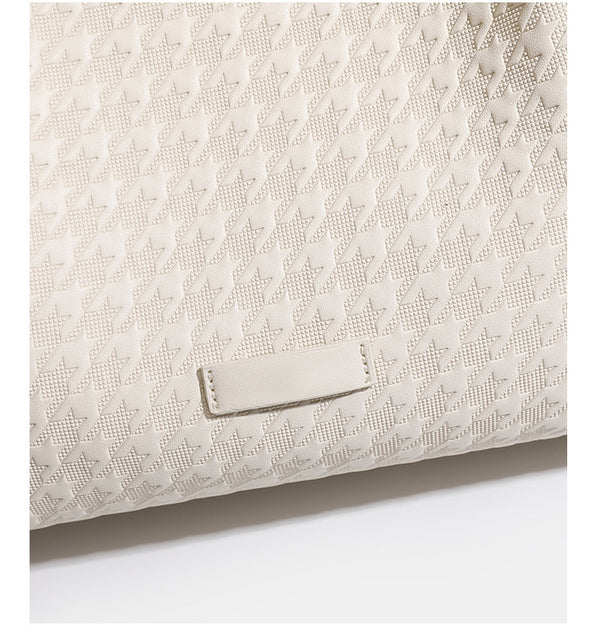 Structured geometric-embossed tote bag with braided shoulder straps and gold-tone hardware in ivory, detail view 15