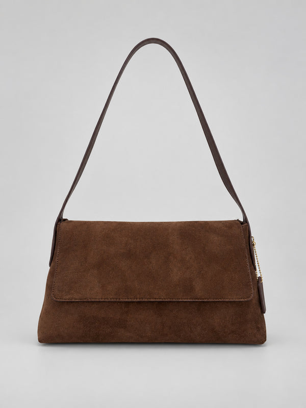 Rectangular matte suede-finish flap shoulder bag with slim dark strap and gold-tone turn-lock hardware, detail view 12