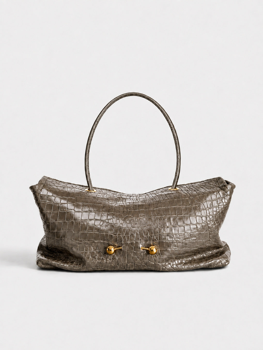 Wide embossed-texture shoulder tote bag with single loop handle and gold-tone toggle hardware, detail view 11