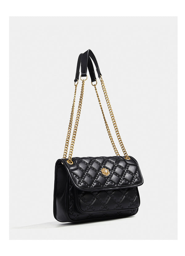 Compact diamond-quilted flap shoulder bag with gold-tone chain strap and floral turn-lock clasp, detail view 13