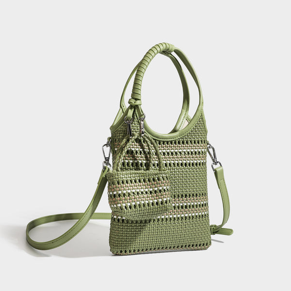 Color-block woven tote bag with rounded leather-look handles, detachable crossbody strap, and matching mini clip-on pouch in