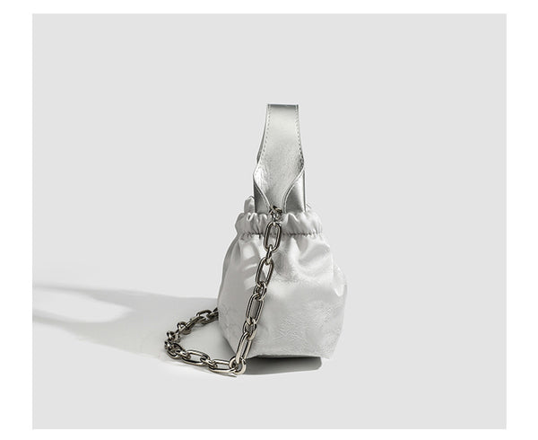 Small ruched satin-finish cloud bag with elasticized drawstring top, short top handle, and chunky silver-tone chain strap