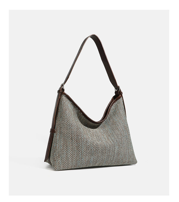 Large slouchy woven shoulder bag with dark brown leather-look trim and adjustable strap, detail view 11