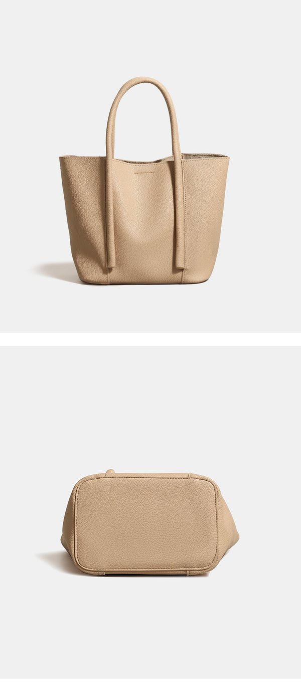 Structured pebbled matte tote bag with front snap pocket, dual top handles, and detachable zip pouch in almond beige, detail