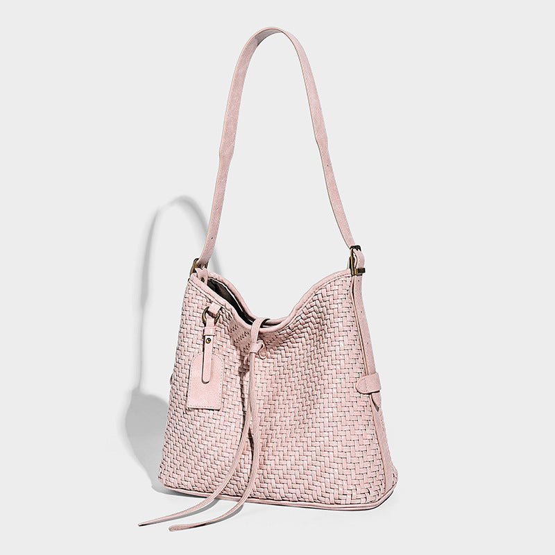 Slouchy woven-texture bucket shoulder bag with tassel tie closure and gold-tone hardware, detail view 11