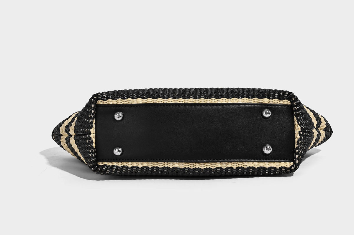 Black and natural striped woven tote bag with chain shoulder strap and silver-tone turn-lock hardware, detail view 24
