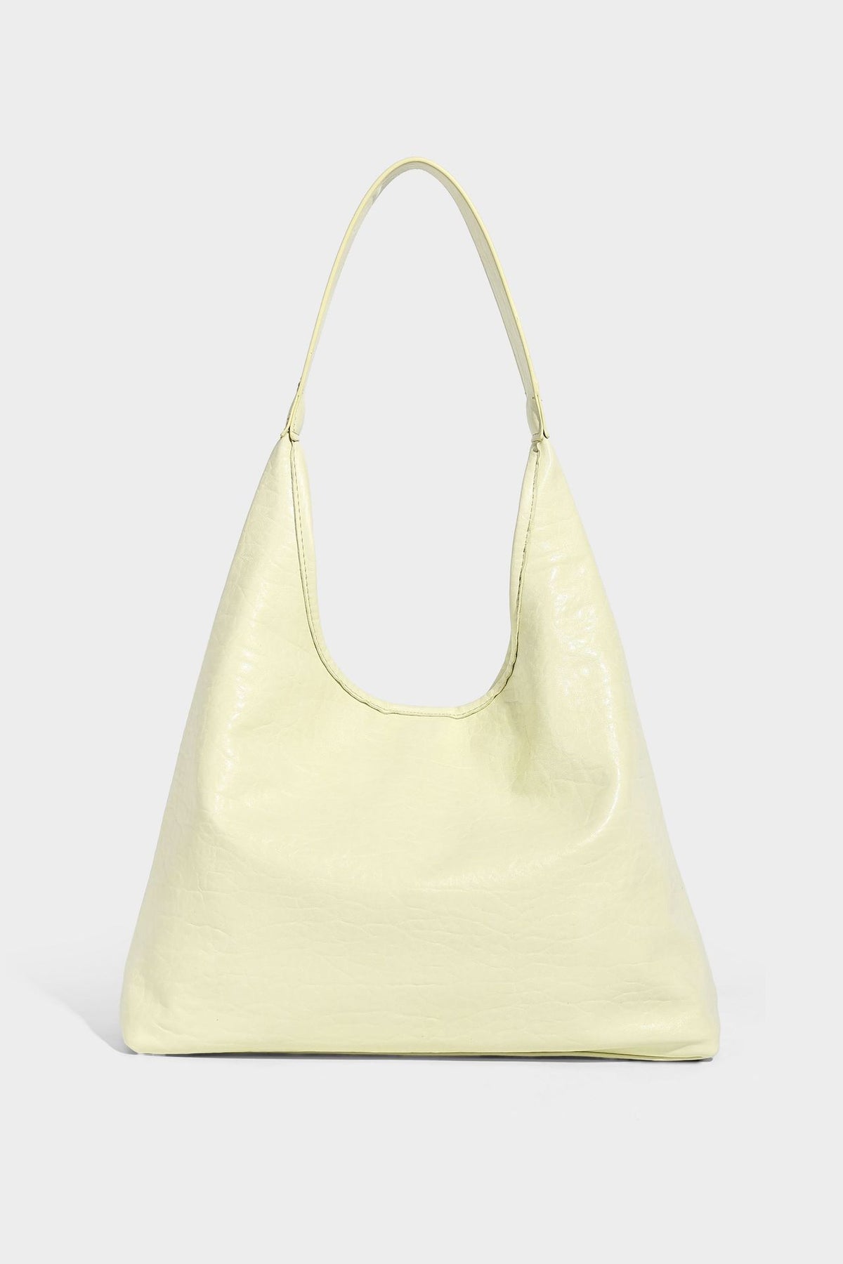 Slouchy hobo shoulder bag in pale yellow glossy pebbled leather-look finish with single shoulder strap and detachable front
