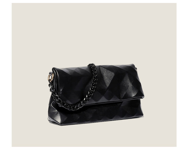 Cream white rectangular flap shoulder bag with geometric faceted surface and chunky tone-on-tone chain strap with gold-tone