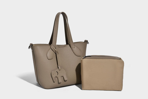 Compact pebbled bucket tote bag with elephant charm, twin top handles, and detachable crossbody strap, detail view 20