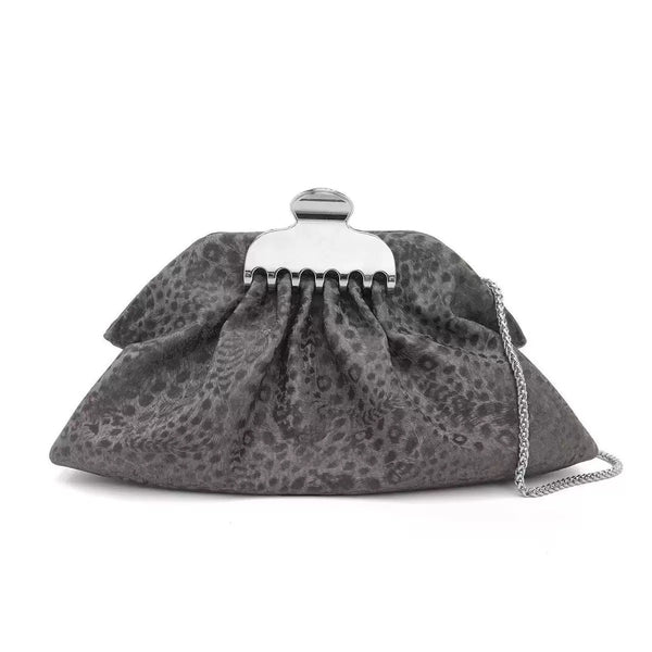 Gathered pouch clutch bag in metallic silver with polished silver-tone frame clasp and fine chain strap, detail view 7
