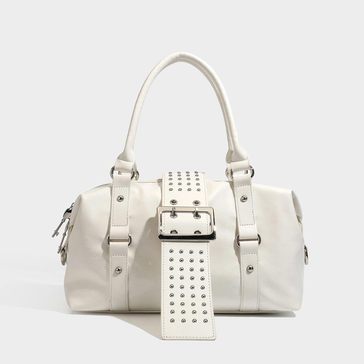 Glossy crinkled barrel handbag with silver stud buckle strap and detachable shoulder strap, detail view 6