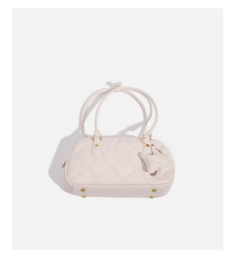 Small structured quilted leather-look zip shoulder bag with gold-tone hardware and adjustable strap, detail view 15