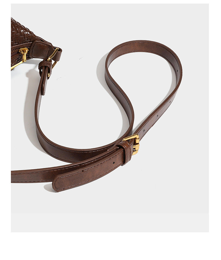 Small glossy basket-weave hobo shoulder bag in brown with knotted top handle, flap accent pocket, and gold-tone hardware