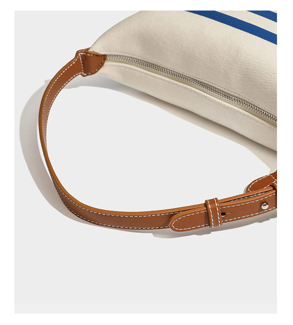 Creme-blau gestreifte Canvas-Schultertasche mit hellbraunem Riemen in Lederoptik und Reißverschluss in Silberoptik, Detailansicht 14