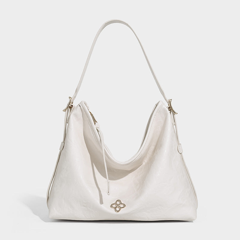 Slouchy leather-look hobo shoulder bag with gold-tone hardware and adjustable strap in brown, detail view 13