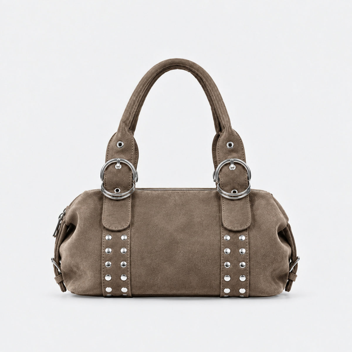 Matte suede-finish barrel bag with silver stud panels, oversized ring hardware, and dual top handles, detail view 3
