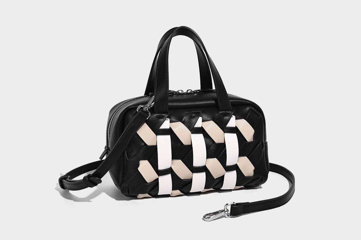 Small structured satchel bag with two-tone woven front panel, dual top handles, and detachable crossbody strap in tan brown