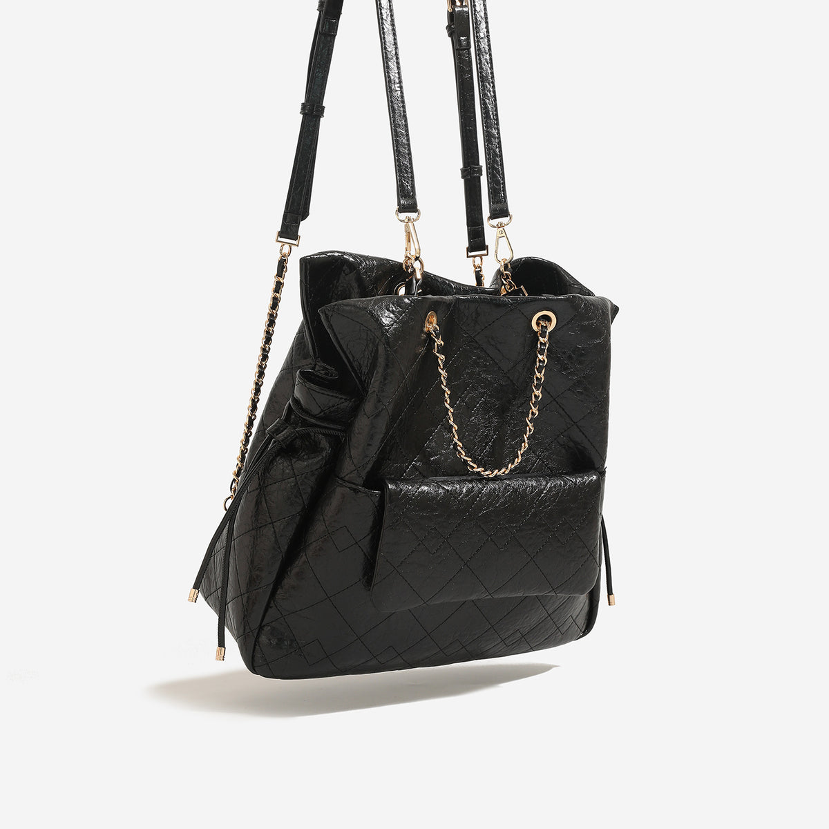 Large quilted leather-look drawstring backpack handbag with gold-tone chain handles and front flap pocket, detail view 2