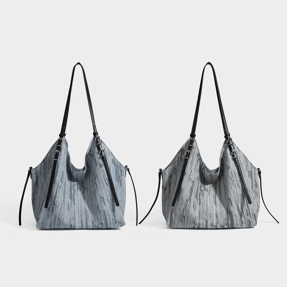Large slouchy woven-texture shoulder tote bag with slim leather-look straps, side cinch ties, and silver-tone hardware