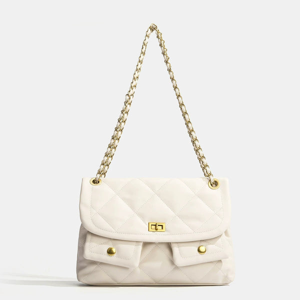 Quilted diamond flap shoulder bag with gold-tone chain strap and twist-lock closure, front view