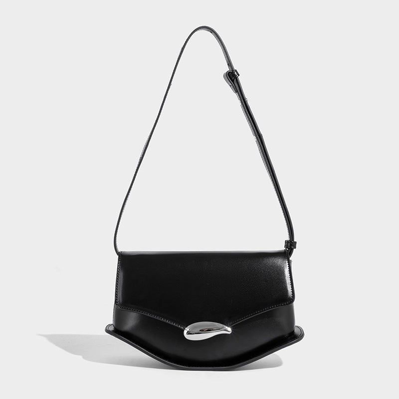 Small structured saddle bag with glossy leather-look finish, angular flap front, silver-tone metal clasp, and slim