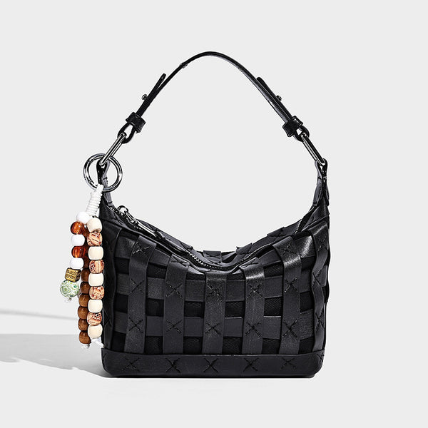 Small woven convertible shoulder bag with top zipper, silver-tone hardware, and detachable crossbody strap, detail view 10