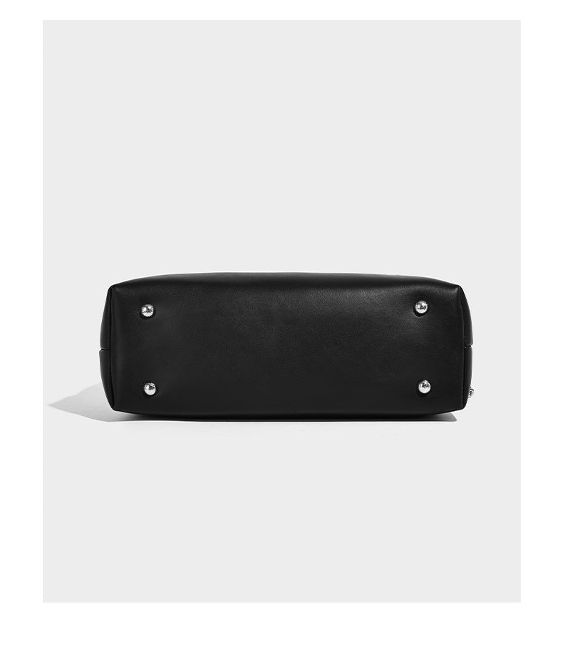 Structured black and beige striped woven shoulder bag with silver chain strap and turn-lock metal clasp, detail view 10