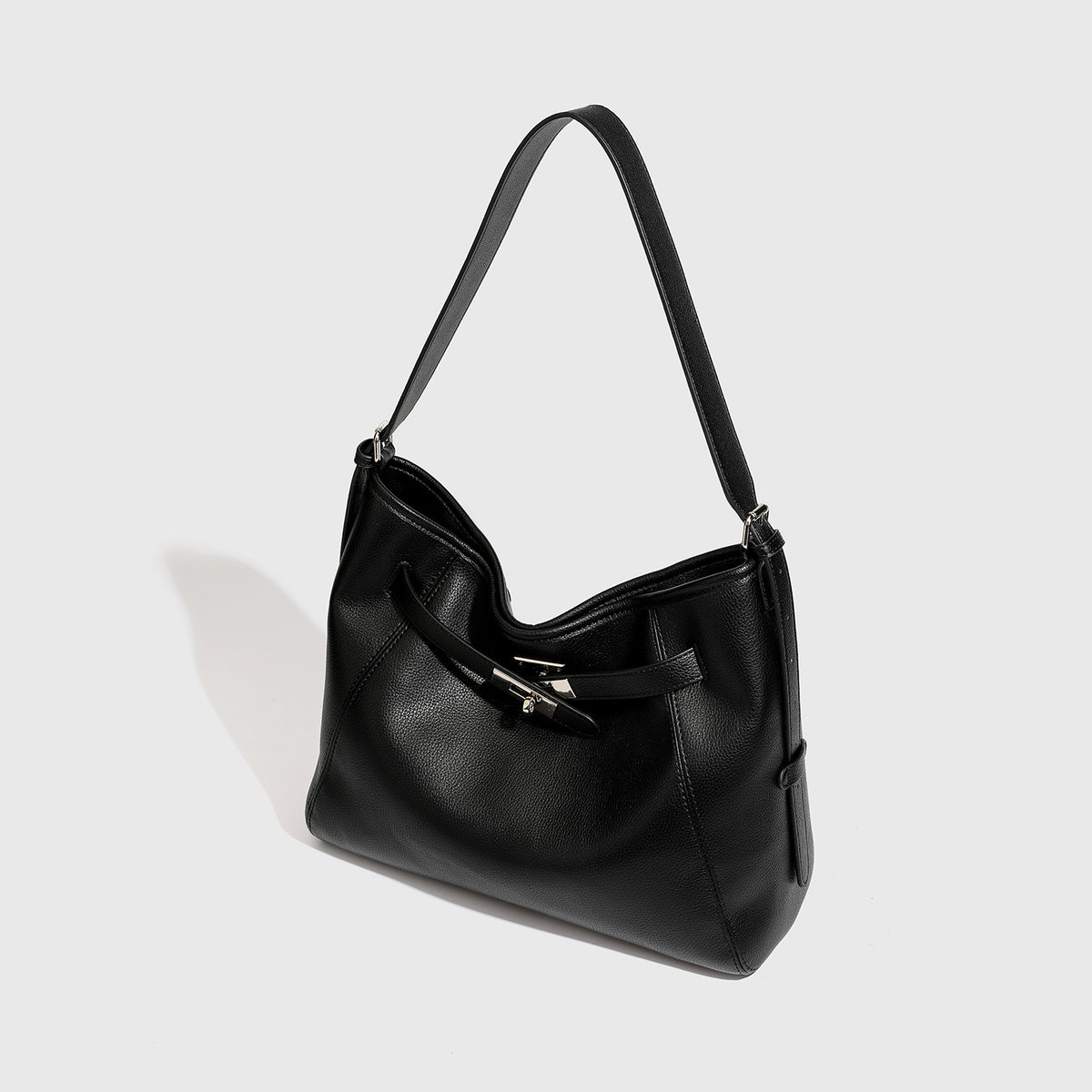 Large black pebbled leather-look hobo shoulder bag with silver-tone turn-lock front hardware and single flat adjustable