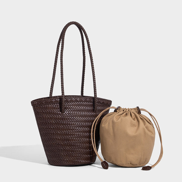 Chevron-woven bucket tote bag with braided shoulder straps and matching drawstring pouch, front view