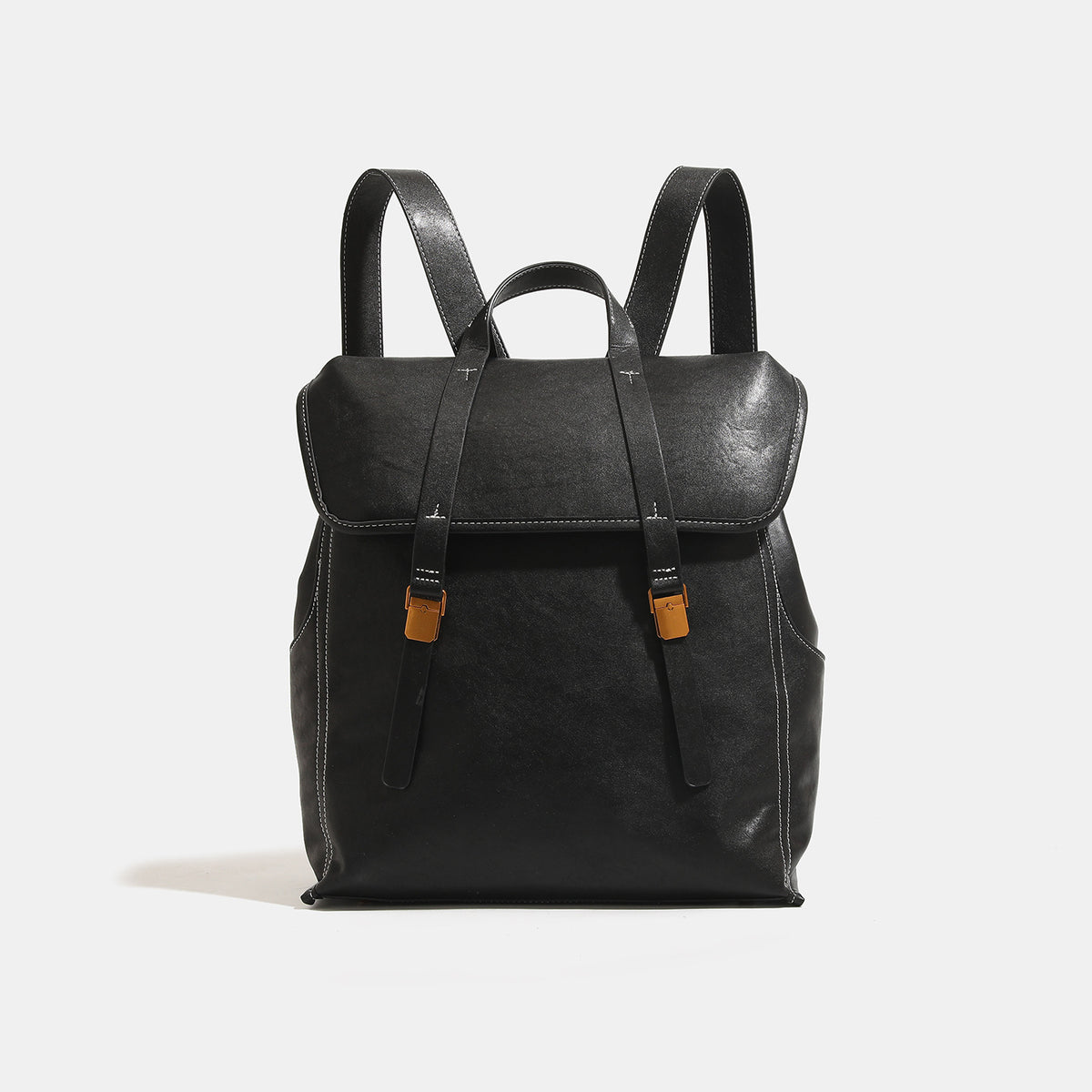 Structured leather-look flap backpack handbag with top handle, buckle front straps, white contrast stitching, and gold-tone