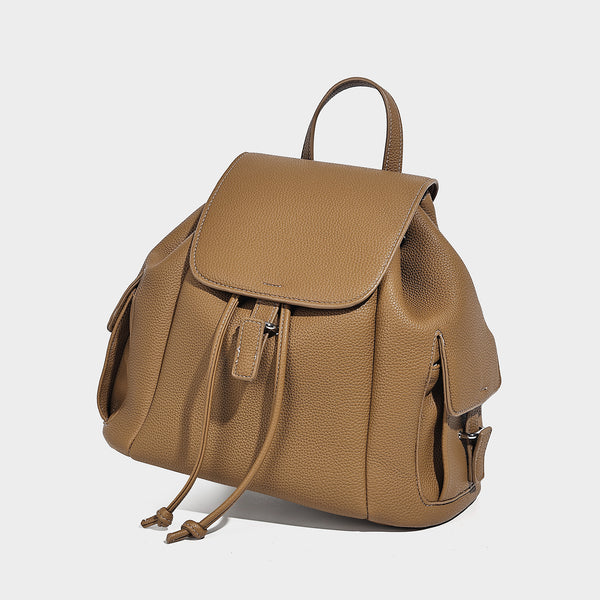 Compact pebbled leather-look flap drawstring backpack handbag with side pockets, top handle, and silver-tone hardware, detail
