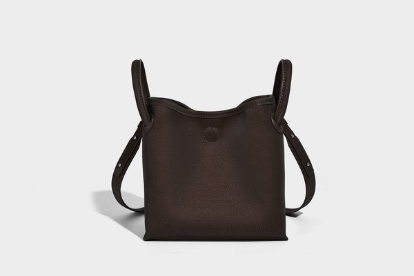 Small structured matte pebbled tote bag with twin top handles and removable zip pouch, detail view 13