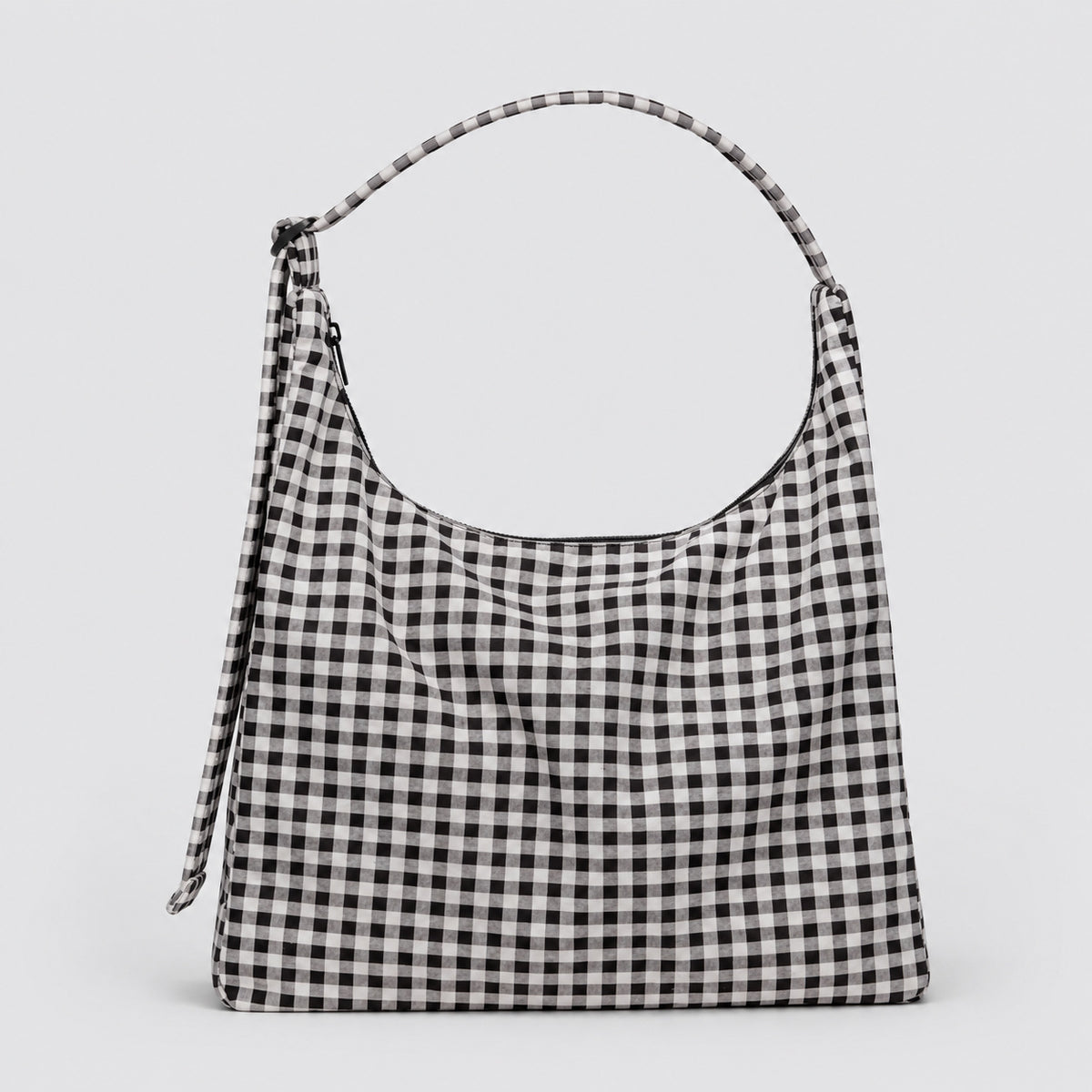 Multicolor plaid and star print hobo shoulder bag with knotted strap and silver-tone zip closure, detail view 9