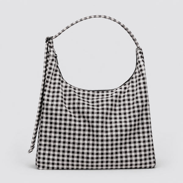 Multicolor plaid and star print hobo shoulder bag with knotted strap and silver-tone zip closure, detail view 9