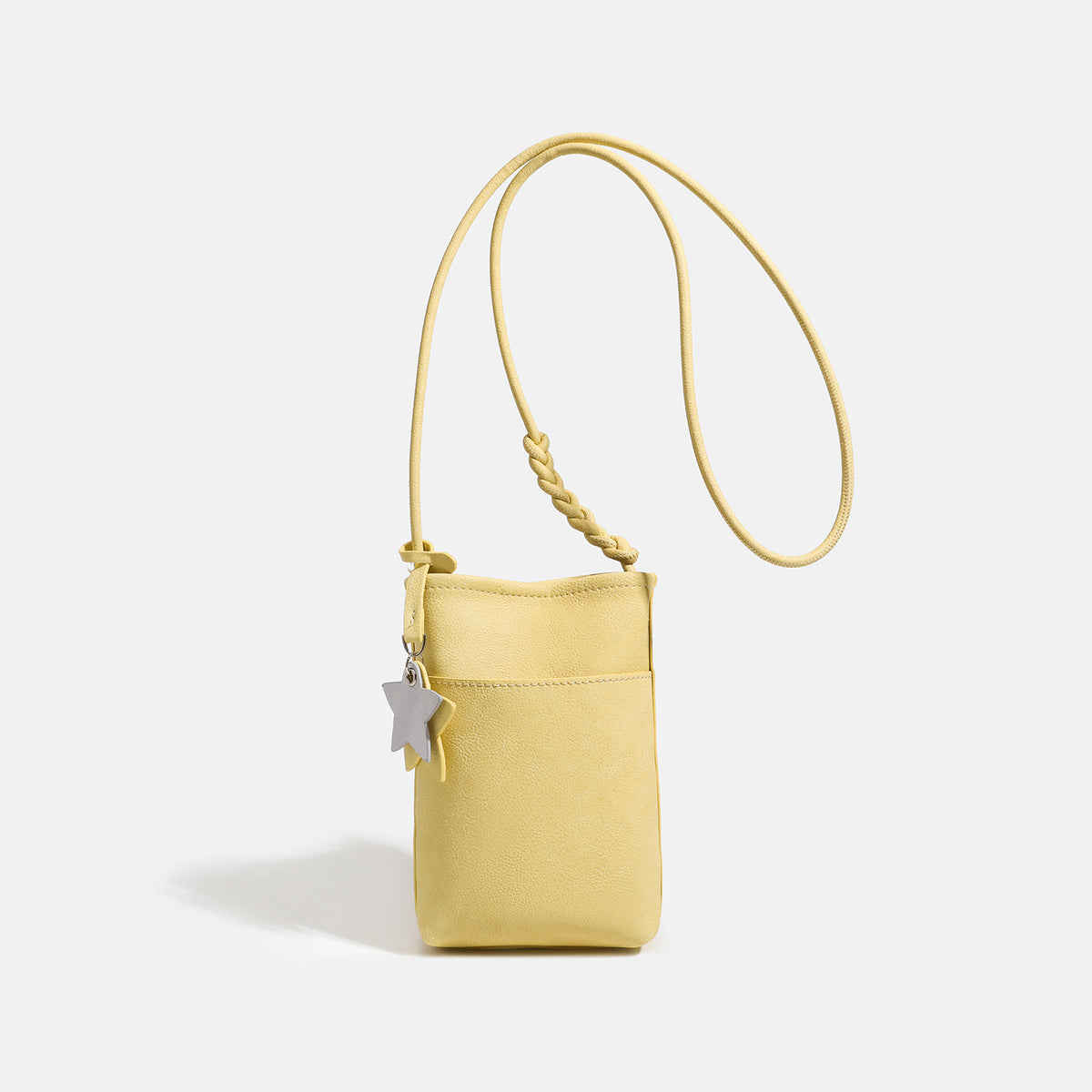 Small vertical textured mini crossbody phone bag with long braided cord strap and silver-toned star charm, detail view 9