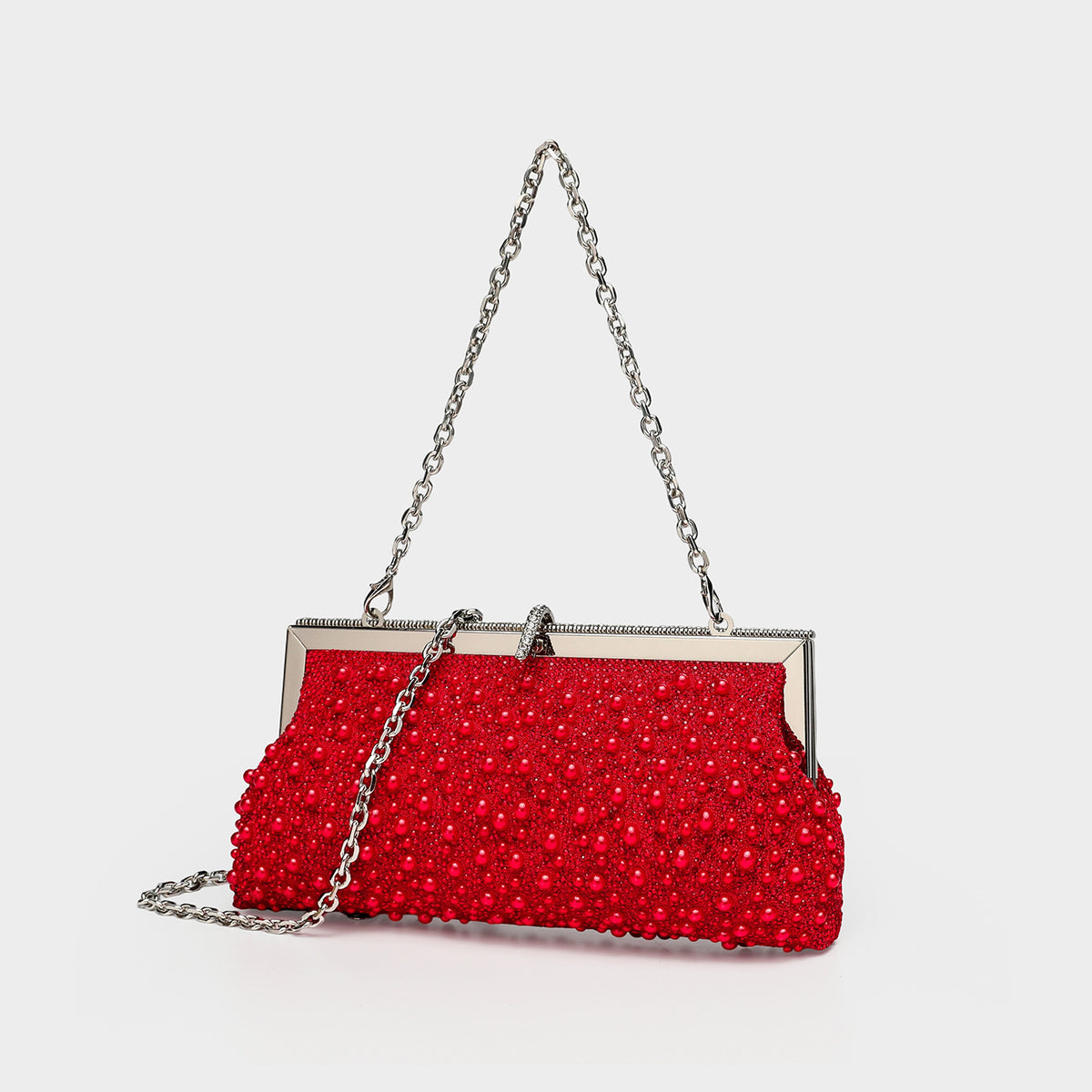 Rechteckige, mit Kunstperlen und Strasssteinen besetzte Abend-Clutch mit silberfarbenem Bügelverschluss und abnehmbarem Kettenriemen