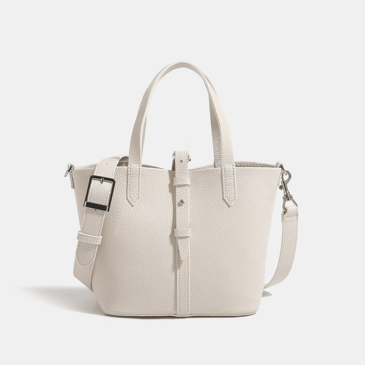Small structured pebbled leather-look bucket tote bag with dual top handles and silver-tone hardware, detail view 7
