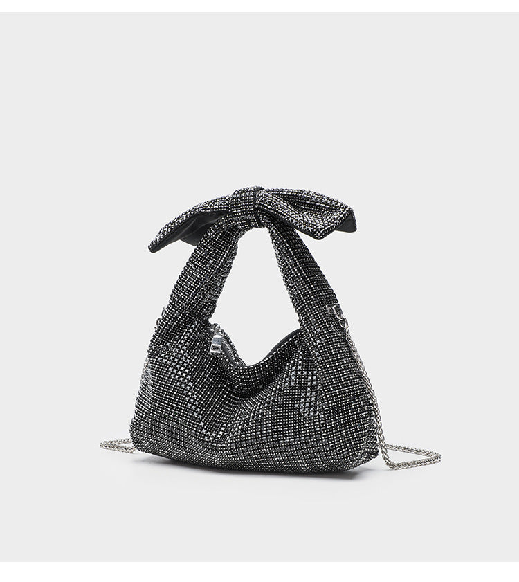 Schultertasche mit rundum besetzter Kristall-Strass-Schleife, Kettenriemen und Reißverschluss, Detailansicht 16
